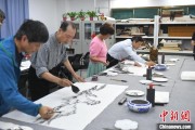 搬家公司两岸艺术家在安徽“共绘一幅画”